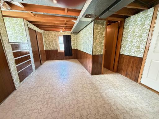 View of bathroom and exterior door