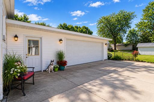 Over-sized, attached two car garage measures 24' x 24' and was built in 2017 with a fresh concrete slab.