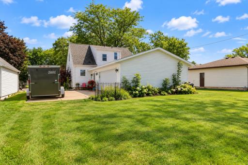 View of the over-sized, attached garage which provides excellent space for vehicles, storage, hobbies, or a workshop.