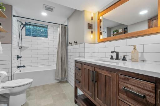 The lower level full bath with heated floors!