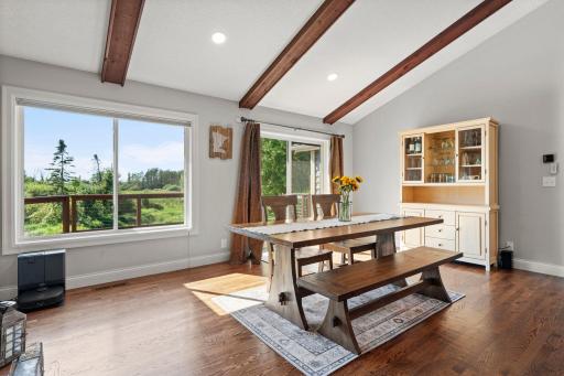 The dining room has a sliding door to the deck.