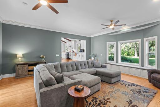 The main level family room has a bay window with window seats.