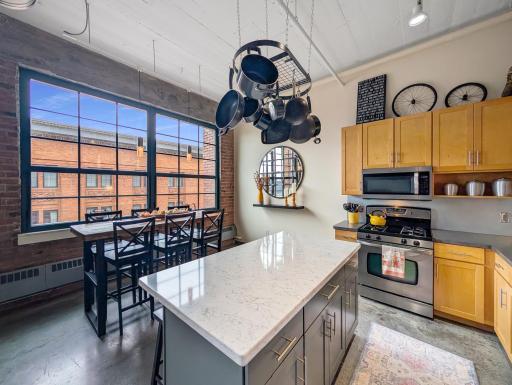 Stunning kitchen with stainless steel appliances.