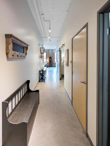 This entryway could be your future "Welcome home" with your own gallery on the wall.