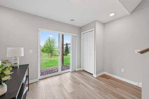 Lower Level Walkout Adds Perfect Natural Light and Access to the Backyard