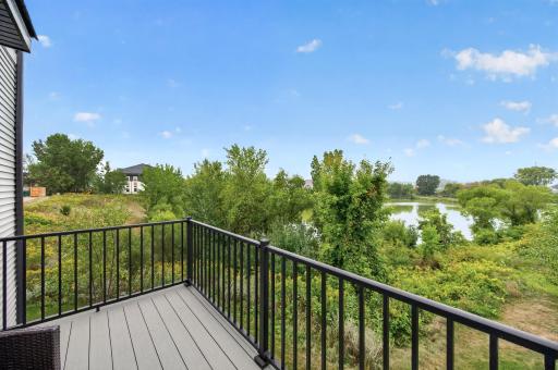 Maintenance Free Deck off of Main Living Area Overlooking Nature Area