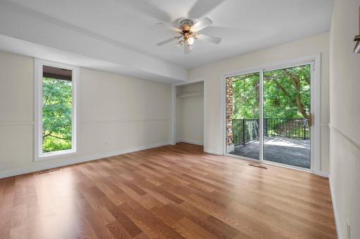 Upper level bedroom shares side deck
