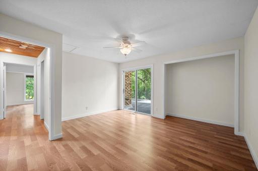 Additional upper level bedroom shares side deck