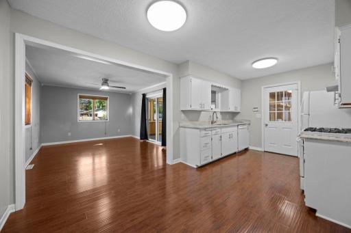 Refreshed kitchen, dining and family room off of the sunroom