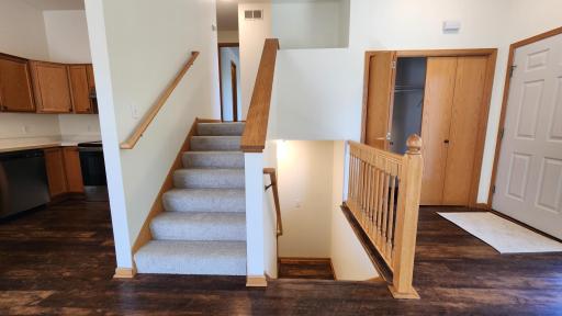 Stairs up take you to the 2 bedrooms, down takes you to the unfinished lower level