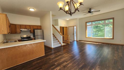 Looking toward the front door. The large window brings in plenty of sunshine