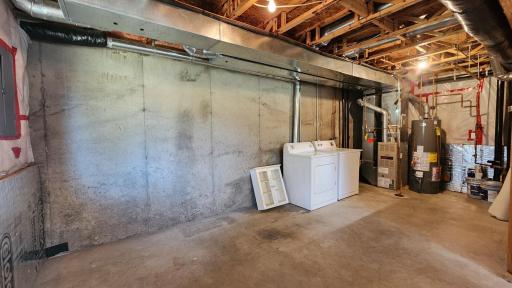 Laundry and utility area in the lower level