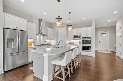 Gourmet Kitchen w/ oversized island, quartz, SS apps + pantry
