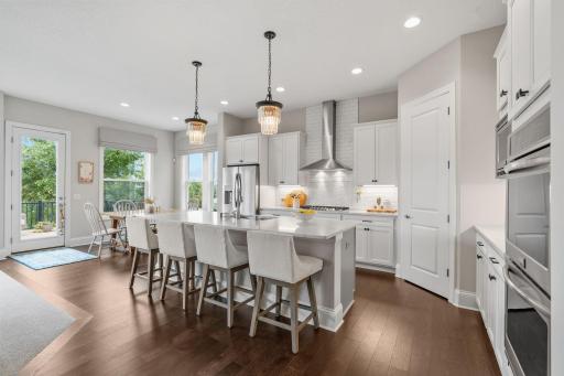 Gourmet Kitchen w/ oversized island, quartz, SS apps + pantry