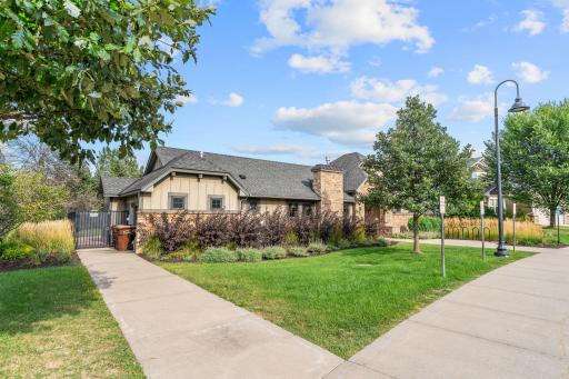 Clubhouse w/ full kitchen, fireplace, TV, bathroom & multiple entertaining spaces.