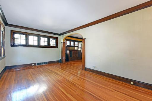 Large living room with gleaming wood floors