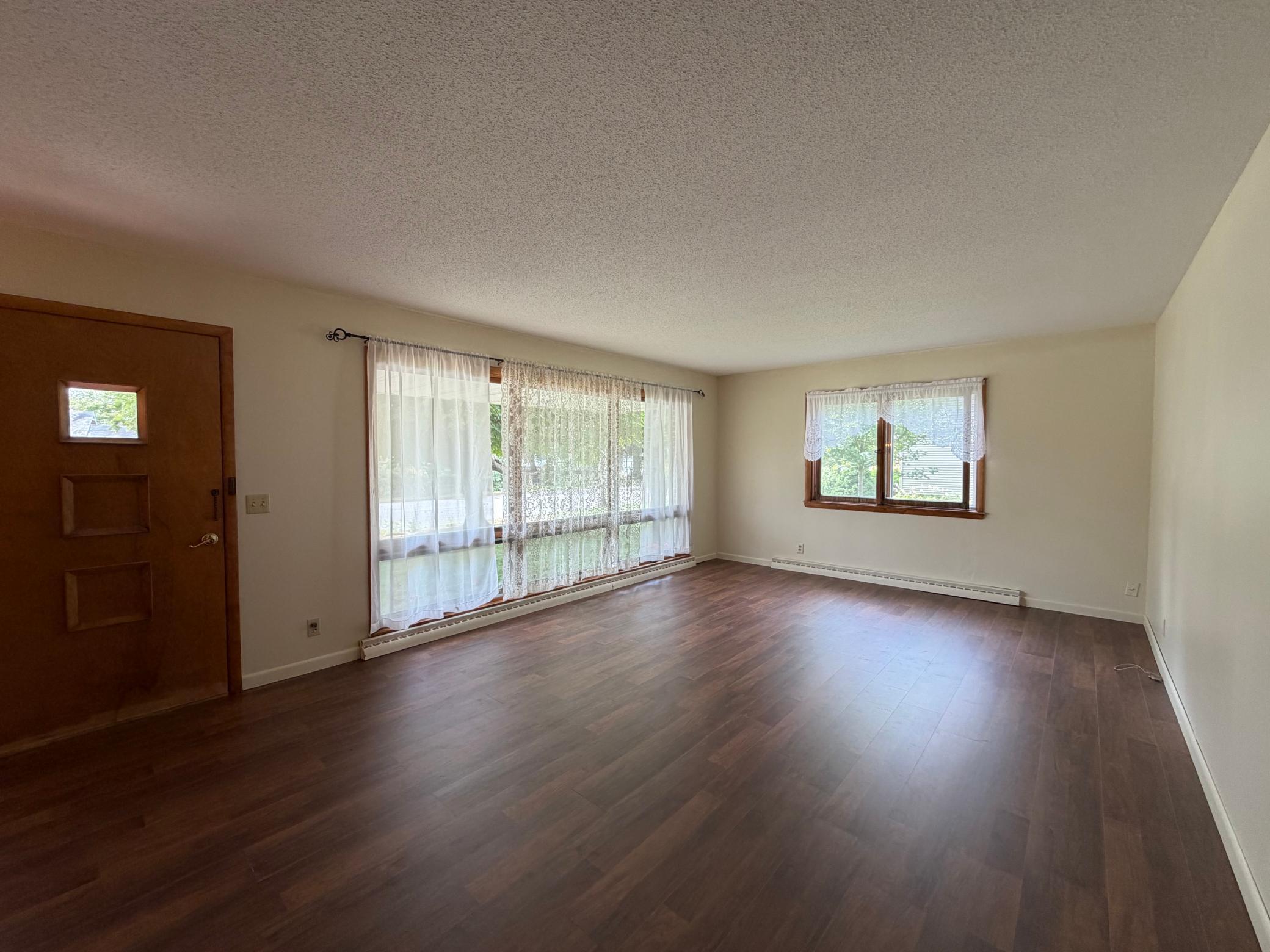 Large living area with floor to Picture window