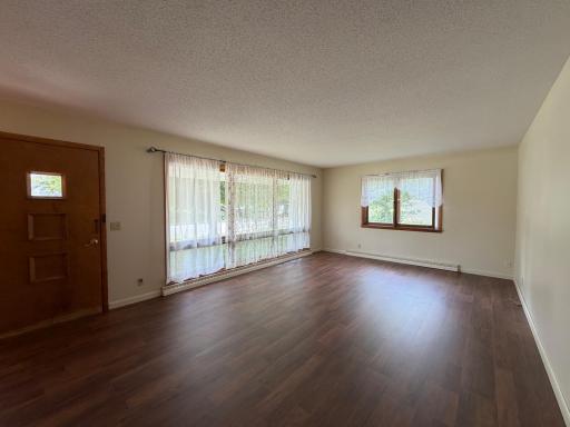 Large living area with floor to Picture window