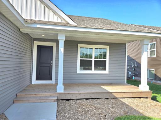 The Finnegan Heartland Cottage at Highlands at Eagle View in Elko New Market. Photo is of similar home. Options and colors may vary. Ask Sales Agent for details.