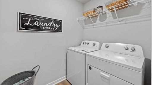 Laundry room. Photos are of similar staged home. Colors and options may vary. Ask Sales Agent for details.