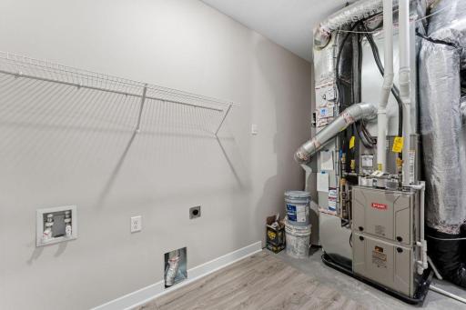 Harmony Utility Room. Photos are of similar staged home. Colors and options may vary. Ask Sales Agent for details.