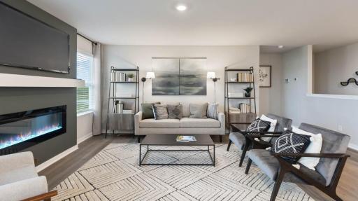 Harmony living room with dark accent wall. Photos are of similar staged home. Colors and options may vary. Ask Sales Agent for details.