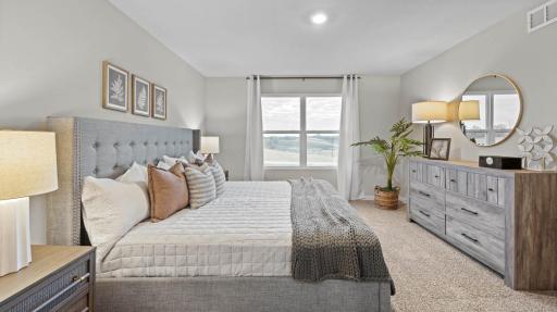 Primary bedroom. Photos are of similar staged home. Colors and options may vary. Ask Sales Agent for details.