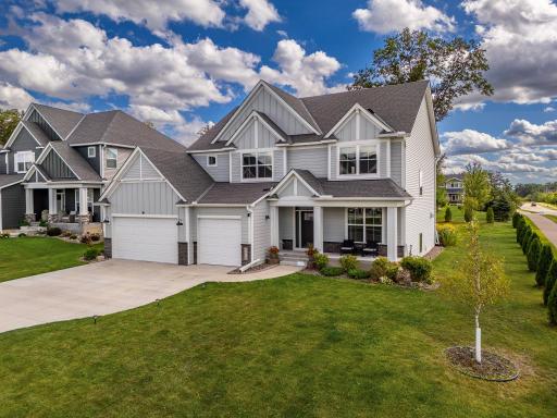 Notice the beautiful evergreen trees along the side of the house!