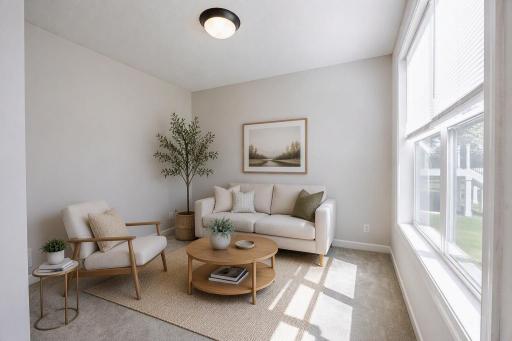 Virtually staged Sunroom on the main level