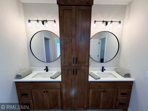 Primary Bath Double Vanity w/ Knotty Alder Cabients