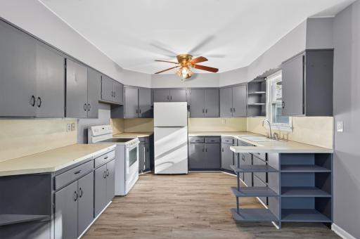 A functional kitchen with plenty of cabinetry and the opportunity to update over time and make it your own.