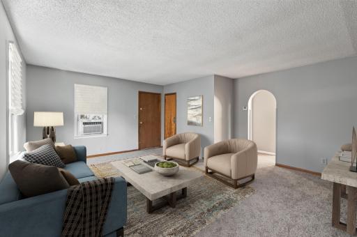 A comfortable main-level living room with great natural light and an easy, functional layout.