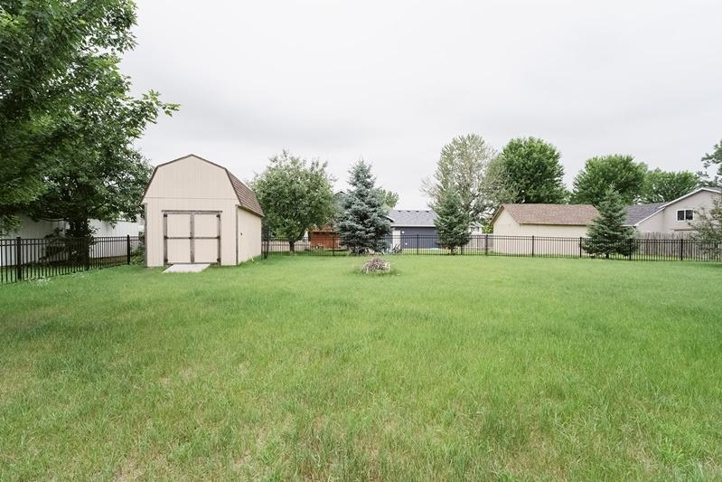 Fully Fenced back yard (new metal fence)