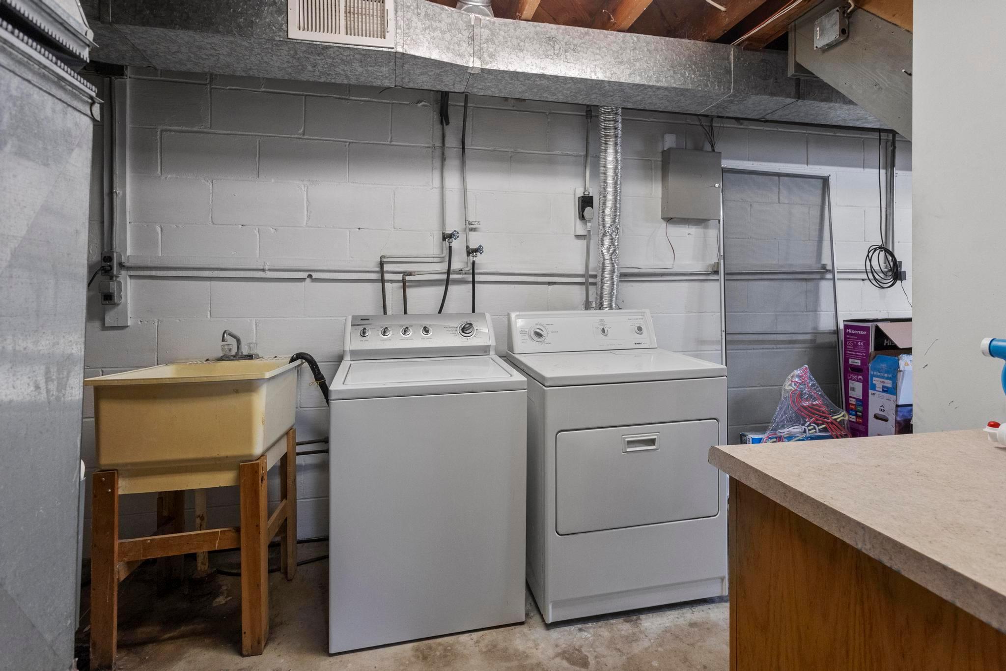 Convenient laundry located in downstairs utility room