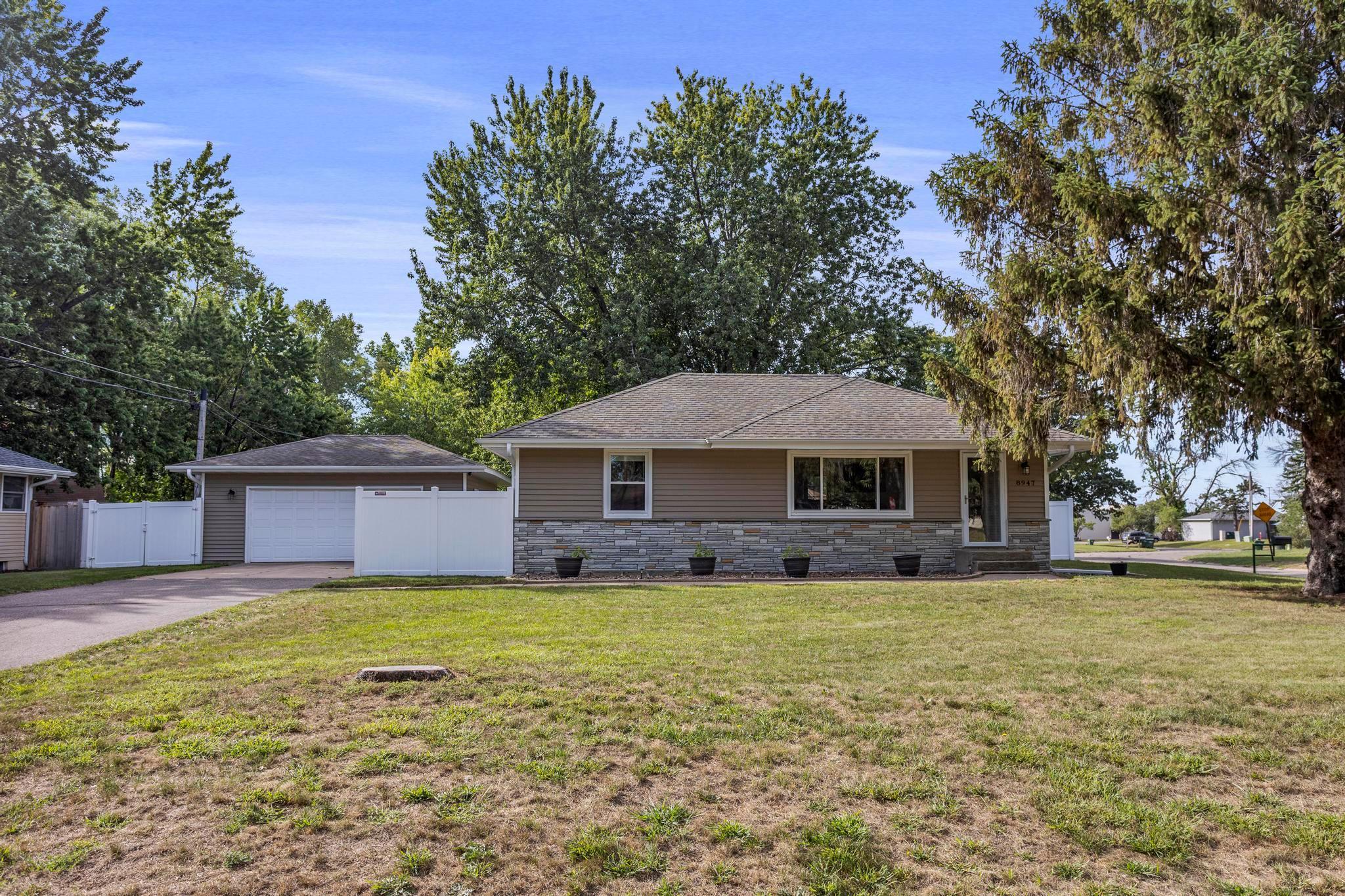 Welcome home to this ideally located corner lot home in Blaine!
