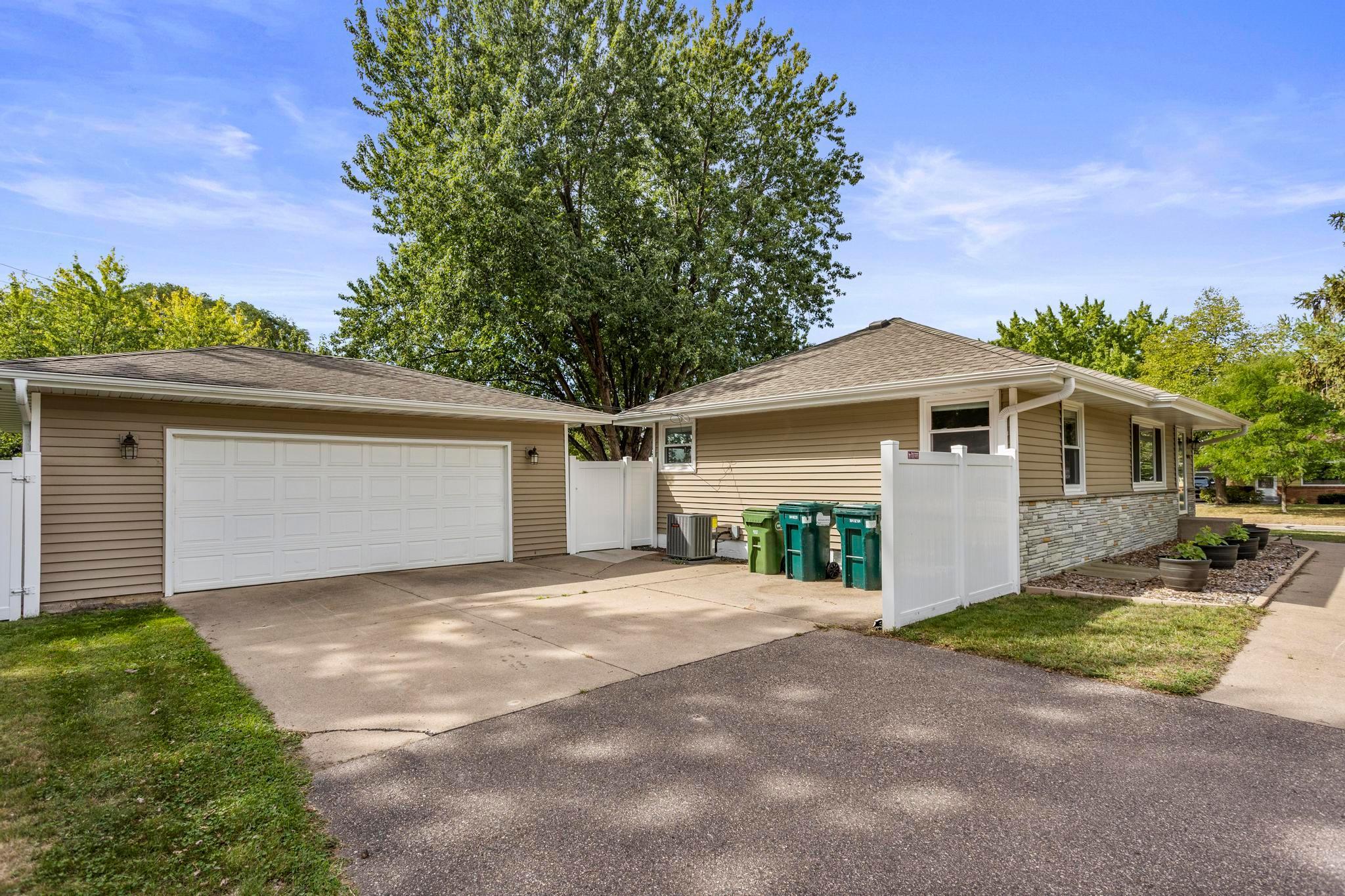 Easy to maintain asphalt paved driveway access to the 2 card detached garage