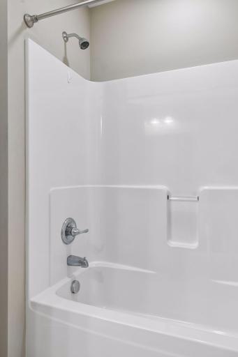 Main bath fixtures are in pristine condition