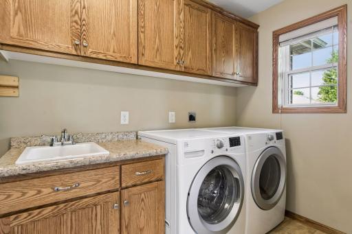 Washer/dryer and utility room is on the same level as the rest of the living space - just off the entrance to the garage