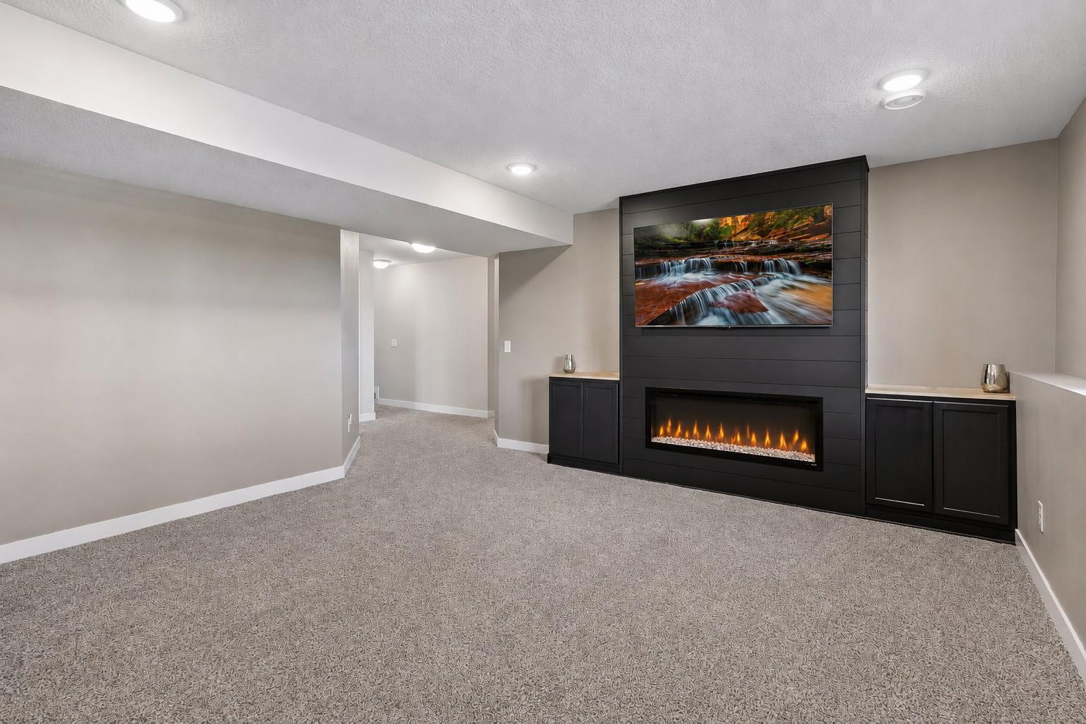 Family Room w/ Fireplace & New Carpet - Lower Level