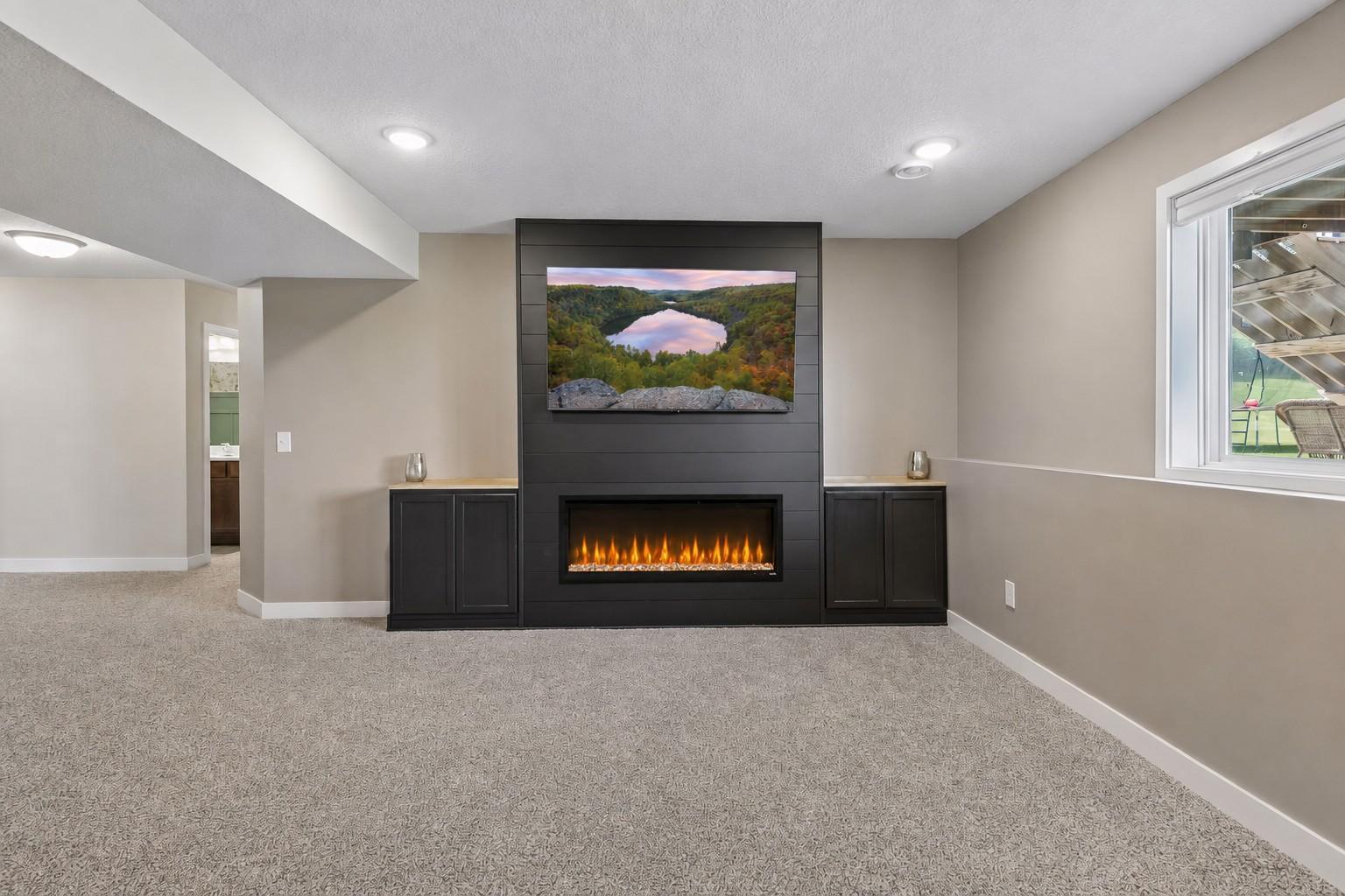 Family Room w/ Fireplace & New Carpet - Lower Level