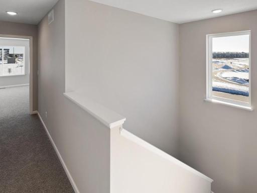 PHOTO OF A DIFFERENT HOME WITH SIMILAR PLAN & FINISHES. Plan and finishes may vary.