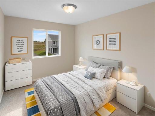 PHOTO OF A DIFFERENT HOME WITH SIMILAR PLAN & FINISHES. Upper Floor Bedroom 2.