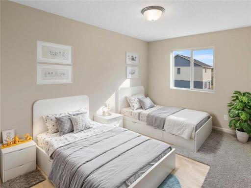 PHOTO OF A DIFFERENT HOME WITH SIMILAR PLAN & FINISHES. Plan and finishes may vary. Upper Floor Bedroom 3.