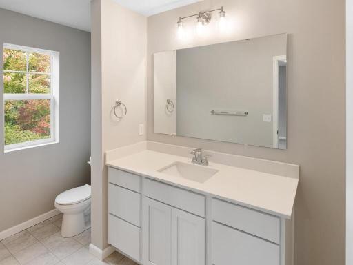 PHOTO OF A DIFFERENT HOME WITH SIMILAR PLAN & FINISHES. Plan and finishes may vary. Primary Suite Private Bathroom.