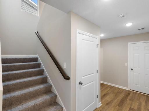 PHOTO OF A DIFFERENT HOME WITH SIMILAR PLAN & FINISHES. Plan and finishes may vary.