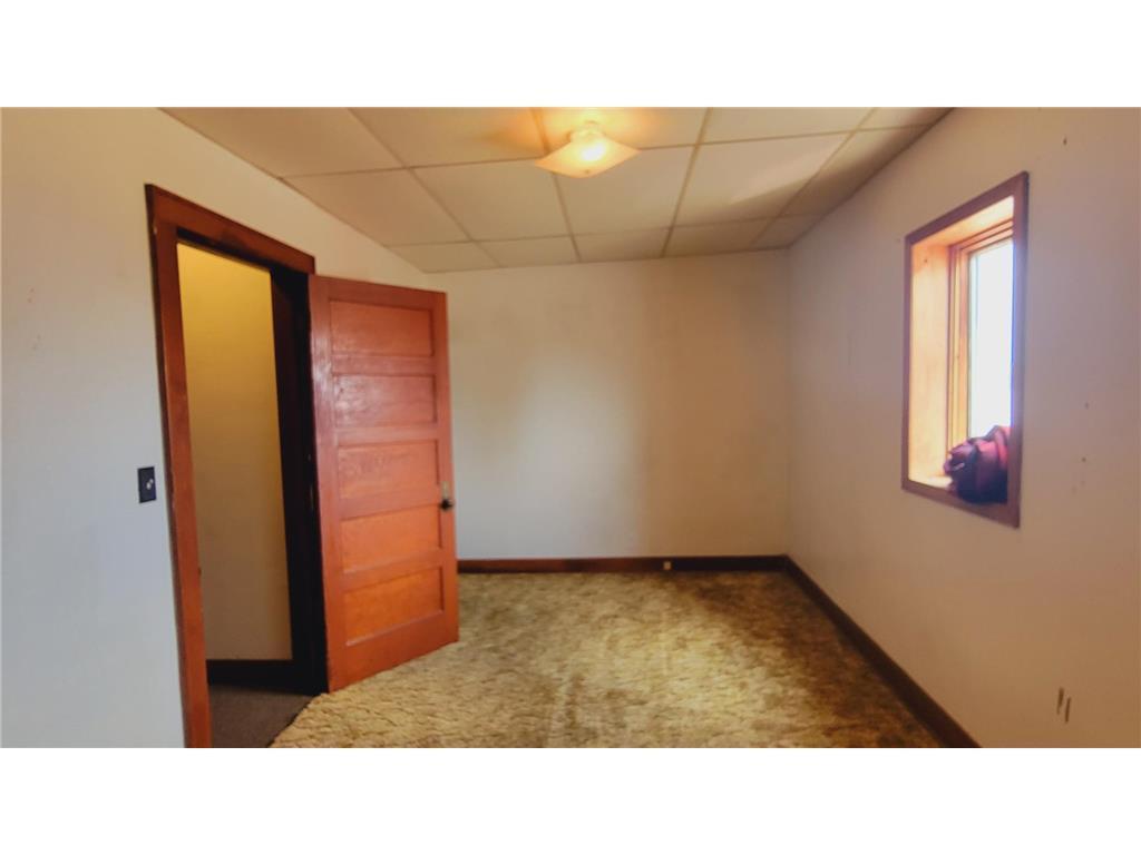 Versatile Layout Featuring Classic Wood Millwork and Deep Window Sill