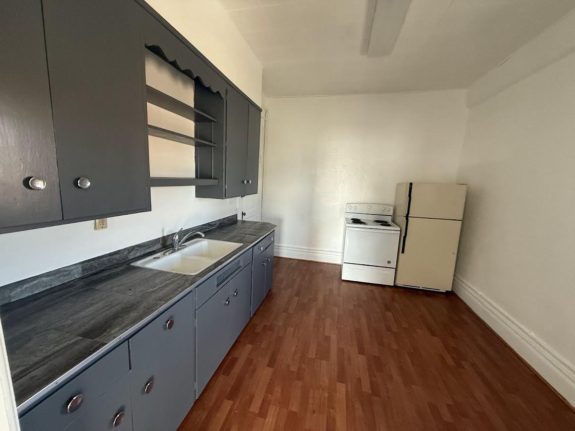 Unit 5: Eat-in Kitchen Featuring Ample Counter Space and Cabinet Storage