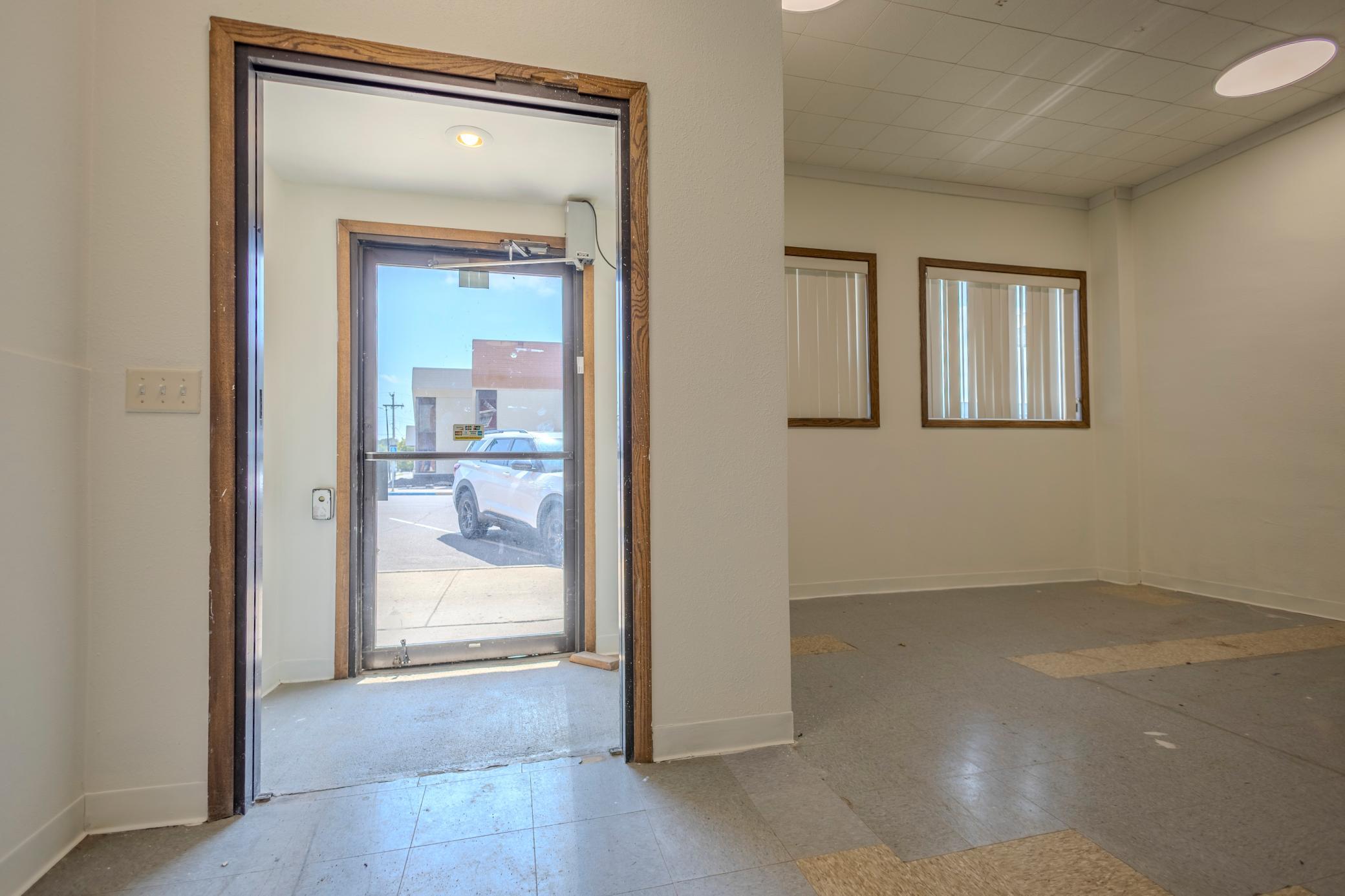 Vestibule / Air-Lock Entrance with Direct Street & Parking Access