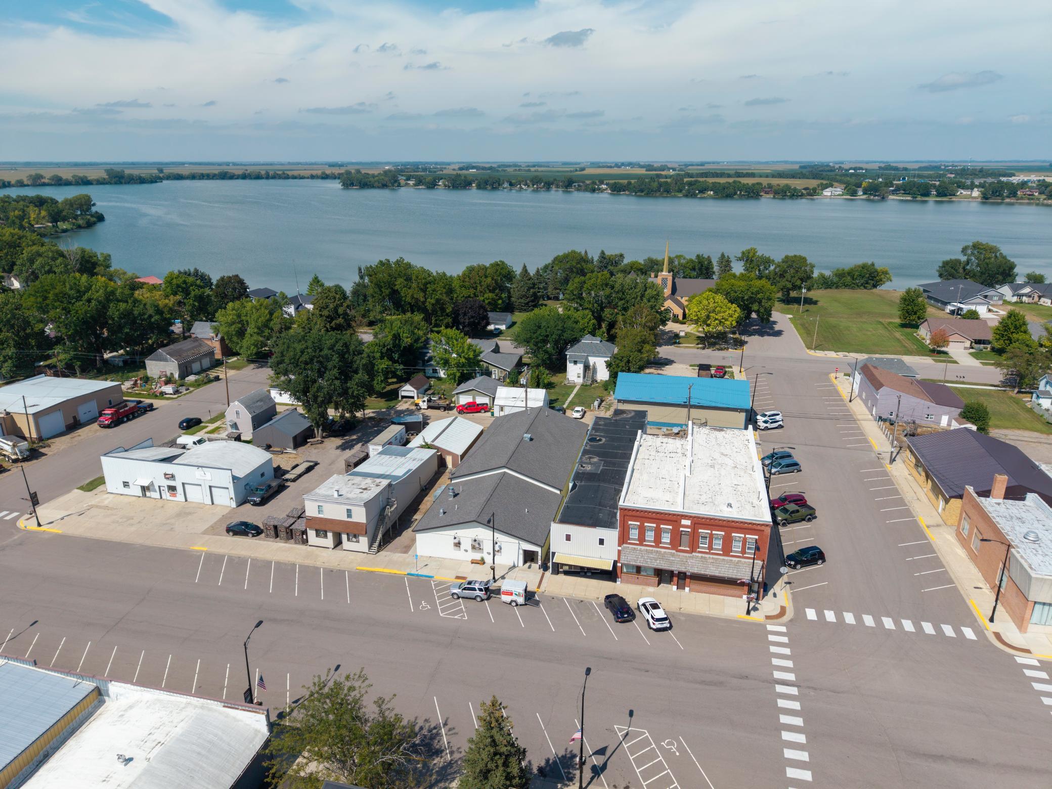 High-Visibility Corner Property Situated in a Picturesque Lakeside Community