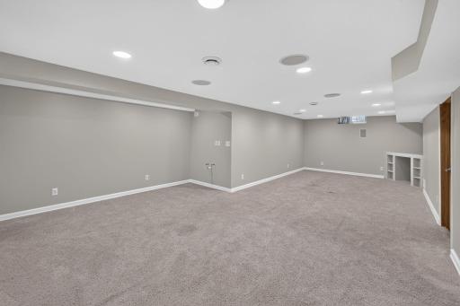 Expansive lower-level family room offers plenty of space for entertaining.